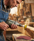Craftsman using Pro Grade 320 Piece 3 Inch Sanding Discs Kit With 16 Grits Hook And Loop Backer Plates in woodworking shop
