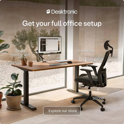 Desktronic HomeOne 60x30 Electric Standing Desk Sit Stand Home Office with walnut surface and monitor arm setup.