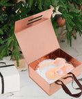 Dope Space Saving Foldable Gift Box For Clothes And Shoes With Adhesive Sticker open near tree, showcasing packaging use