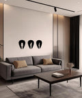 Living room with Set Of 3 Black Guitar Silhouette Wall Art On Engineered Wood 11x40 Inch Modern Wall Decor above sofa.