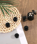 Flexible Ball And Socket Head Microphone Adapter Kit With Four Adapters on wicker mat and wooden surface
