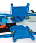 Real Deal Adjustable Featherboard For Router Table And Table Saw Safety Workholding Wedge Lock Mount Fits Miter Slot T Track Holds stock tight in blue plastic with clamps.