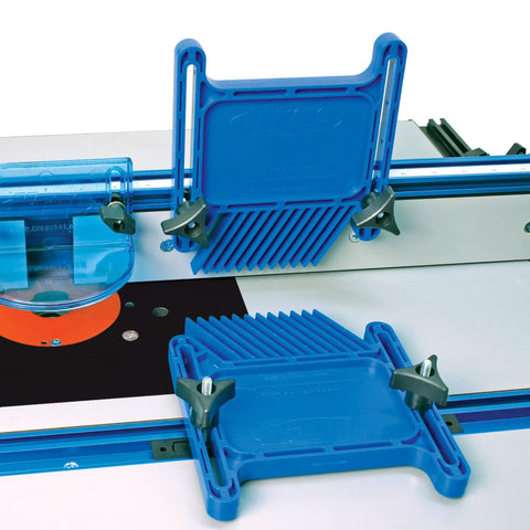 Real Deal Adjustable Featherboard For Router Table And Table Saw Safety Workholding Wedge Lock Mount Fits Miter Slot T Track Holds stock tight in blue plastic with clamps.
