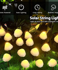 Two Pack 32 LED Mushroom Solar String Lights, 55 Ft Outdoor Waterproof Garden Decoration With 8 Lighting Modes glowing at night