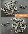 Thirty Piece Kickass Heavy Duty Trigger Snap Hooks With Swivel Action Zinc Alloy Build, showing multiple hooks for lanyards and pet cages.