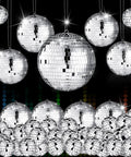 65 Pcs Mirror Disco Balls Set for Hanging Decor in Assorted Sizes 3cm 5cm 6cm 8cm Silver Party Ornaments reflecting light on black background