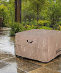 Square 44 Inch Patio Fire Pit Table Cover Waterproof Outdoor Shield Keeps Rain Snow Leaves And Bird Droppings Out With Beefy 600D Polyester And Breathable Vents For Easy Airflow And Long Lasting Protection covering a table in rain on a patio