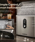 Top Tier Countertop Nugget Ice Maker Churns Out 35 Pounds Of Chewable Pebble Ice In Just Seven Minutes With Self Cleaning Design And Removable Basket For Everyday Chill Sessions In Silver, showcasing controls and ice.