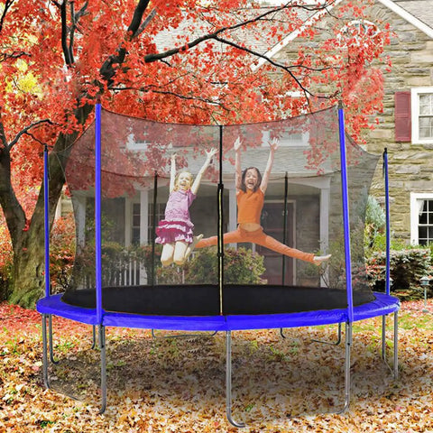 Children jumping on a trampoline in autumn, secured with Heavy Duty Trampoline Ground Anchors 10 Inch U Type Wind Stakes 8 Pack.