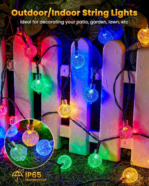 Outdoor 35Ft String Lights With 10 Shatterproof LED Bulbs Waterproof Patio Lanterns illuminating a garden fence with multicolor glow.