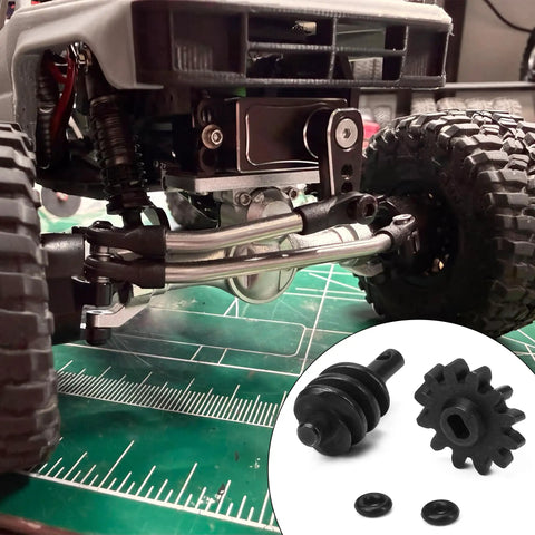 RC crawler underside with Overdrive Helical Gear Set 2-12T For 1/24 Axial SCX24 Crawler Upgrades With Steel Worm Gears shown