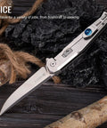 Hard Hitting Tactical Folding Pocket Knife For Men With 14C28N Stainless Steel Blade on rustic wood and rope background