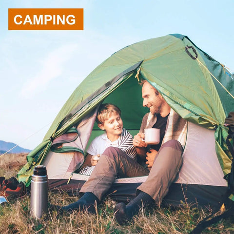 Father and son enjoying coffee in a tent, highlighting the use of Beefy 12kN Heavy Duty Carabiner Clips With Ultralight Screw Lock Locking Design For Keychains, Hammocks, Dog Leashes, Camping And Gym Rigs, Snag Free D Ring Clip For Secure Everyday Use during camping.