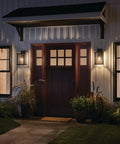 Outdoor Wall Light Sconce In A Sleek Dope Black Finish With Clear Seeded Glass, 17 Inches High By 10 Inches Wide, illuminated entryway