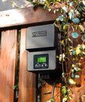 Outdoor Low Voltage Transformer 300W With Astronomical Timer And Built In Photo Sensor For Landscape Lighting mounted on fence