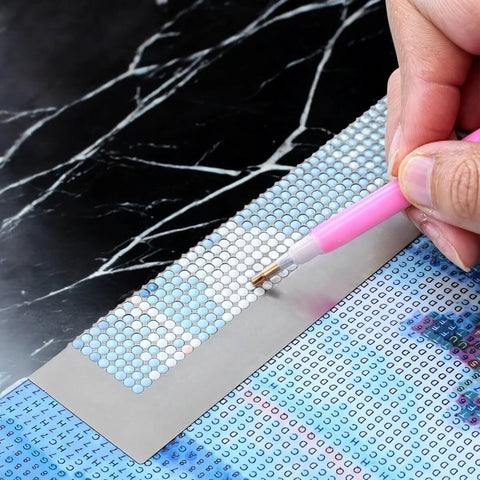 Diamond Painting Ruler With 1020 Blank Grids And Diamond Mesh Alignment Tool for 5D art, round drill guide in use on canvas.