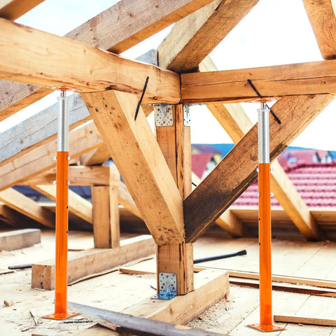 2 Pack Adjustable Screw Jack Posts Built Like A Rock With Zero Hassle Setup, 37 To 61 Inch Height Range, Heavy Duty Basement Floor Support For Joist Lifting And Cellar Ceilings, 11023 Lbs Safe Lift Capacity, Orange supporting wooden beams on a construction site.