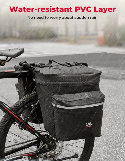 34L Waterproof Bike Pannier Bag With Rain Cover for Rear Rack on bike, showing water-resistant PVC layer in rain, black.