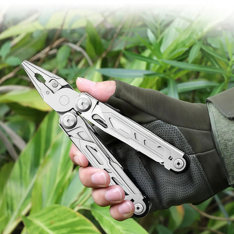 All In One 16 In 1 Multitool Pliers With Spring Loaded Pliers Head held outdoors in gloved hand