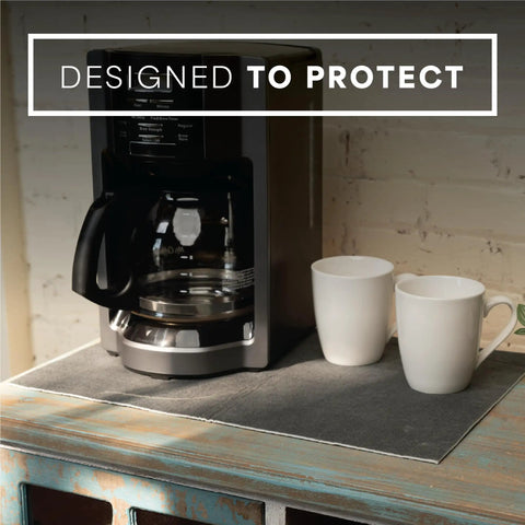 Absorbent Coffee Mat For Countertops 12 By 18 Inch Spill Catcher Pad under coffee maker with two white mugs.