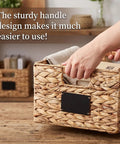 Hands holding Two Pack Wicker Storage Baskets Rectangular Water Hyacinth Organizer For Shelving Foldable Woven Pantry Baskets