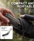 Hand placing Compact Bike Repair Tool Kit With Flip Case L Ball End Hex Wrench 7 S2 Bits into bike saddle bag