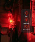 Aurora A8 G4 Keychain Flashlight USB C Rechargeable 5000K High CRI 420 Lumens clipped to backpack with red sidelight