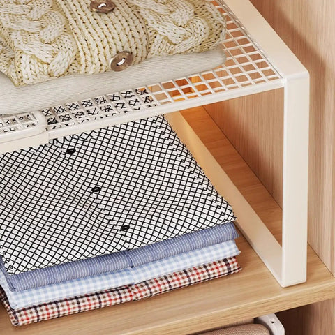 Closet Shelf Organizer Metal Storage Rack for home wardrobes showing folded linens on iron frame for space saving.