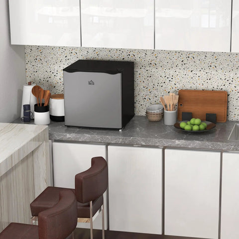 Keep Your Stash Ice Cold With This Sick 1.1 Cu Ft Countertop Freezer in a modern kitchen setting with utensils and decor.