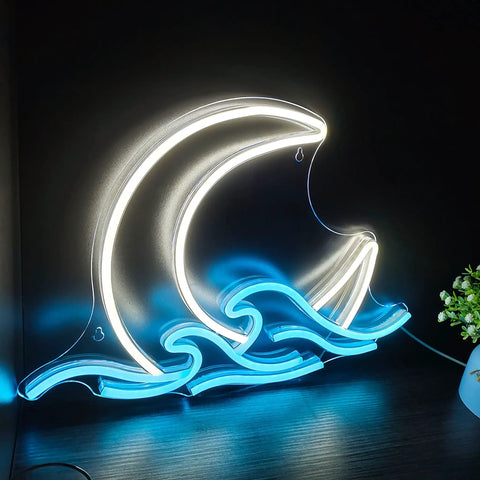 Moon Over Sea Neon Light Sign For Room Decor illuminating a wave and crescent moon design on a black wall, 17.12x11.8 inches.