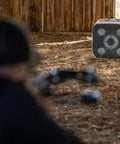Open Archery Target for Youth 16 Inch With 40 Lb Draw Compatibility in backyard setting, showing target detail and setup