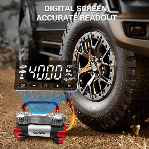 6X Faster Inflation Digital Dual Cylinder Portable Air Compressor 12V Metal Tire Inflator next to truck tire with digital display