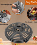 Upgraded 4 Quart Air Fryer Crisping Plate Fits Ninja AF100 And Similar 4 Qt Baskets Premium Nonstick Grill Pan Tray shown being cleaned.