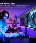 Premium Microphone Boom Arm With Desk Mount, 360 Rotatable And Fully Adjustable, shown in gaming setup with dual monitors