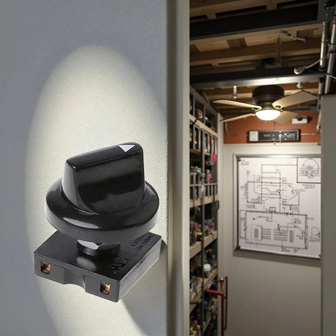 Close-up of Ceiling Fan Rotary Switch Four Position Three Speed Selector With Push Button Control on wall, installed in room.