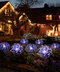 Night garden with Must Have Outdoor Solar Firework Stake Lights With 120 LEDs Waterproof 2 Pack Sparklers String Lights glowing