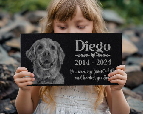 Girl holding Personalized Pet Memorial Stone With Photo For Dogs And Cats Custom Headstone And Garden Marker With Image