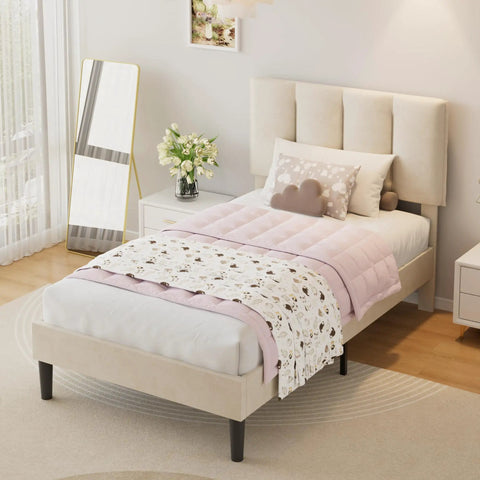Twin Size Bed Frame Featuring Extra Thick Velvet Upholstered Headboard And Heavy Duty Hardwood Slats Pale Beige Platform mattress base with pink bedding.