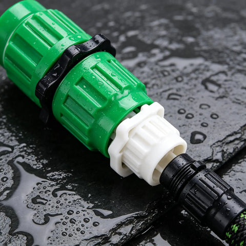Ultimate 2026 Expandable Garden Hose Repair Kit Features Universal Female And Male Connectors That Fix Leaky Hoses In Minutes For Most 3/4 Or 5/8 Inch Water Lines Up To 100 FT Including Retractables And Plastic Models Perfect Green Solution. Green ABS plastic hose repair connector with white and black fittings, wet on surface