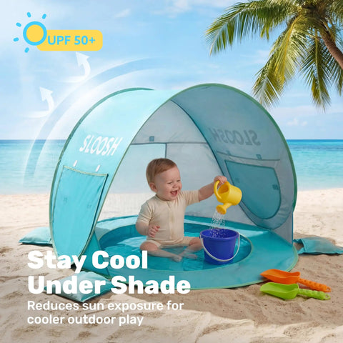 Baby playing in Baby Beach Tent Pop Up Shade Pool With UPF 50 UV Protection Sun Shelter For Infants on beach