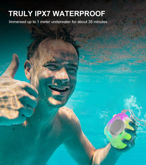 Man underwater holding Shower Bluetooth Speaker Waterproof IPX7 With Floating Design And LED Light Loud HD Sound With Rich Bass