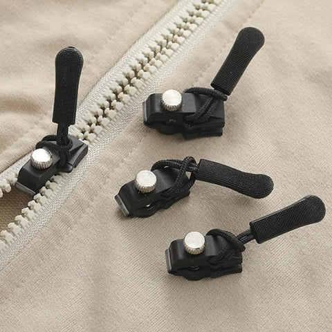 Zipper Pull Repair Kit For Clothing Backpacks Tents And Outdoor Gear Durable Black Plastomer Pulls shown on beige fabric