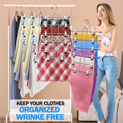 Woman displaying three pack closet organizers with six tier pants hangers with clips for space saving wardrobe organization.