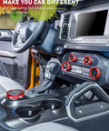Red billet aluminum knob trim set installed on Ford Bronco console; HVAC, 4WD, headlight and radio controls (2021–2025)