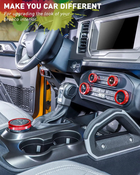 Red billet aluminum knob trim set installed on Ford Bronco console; HVAC, 4WD, headlight and radio controls (2021–2025)