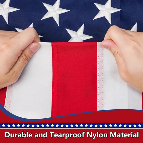 Close-up of hands holding 2.5 By 4 Ft American Flag Pole Sleeve For Outdoor Use, Built To Last Nylon Construction, Tear Resistant, with stars visible