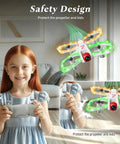 Child operating kid friendly mini drone with 720P camera for beginners and teens, showcasing safety design with propeller guard.