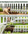 15 Pack Dog And Critter Barrier Fence With 21.25 Feet Of No Dig Under Fence Barrier showing installed sections with animals