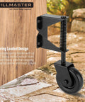 Beefy 4 Inch Gate Wheel Caster Kit With Spring Loaded Gate Helper attached to wooden fence, black powder coated finish.