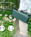Person holding Built Tough Garden Kneeler And Seat Foldable Stool with tool pouch and storage bag on grassy path.